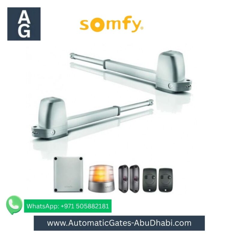 SOMFY IXENGO JL 230V swing gate opener kit including two motors, control board, remote, safety sensors, and flashing light.