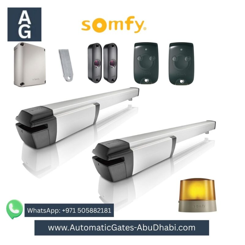 SOMFY IXENGO L 24V automatic swing gate motor kit, including two motors, control board, remote, safety sensors, and flashing light.