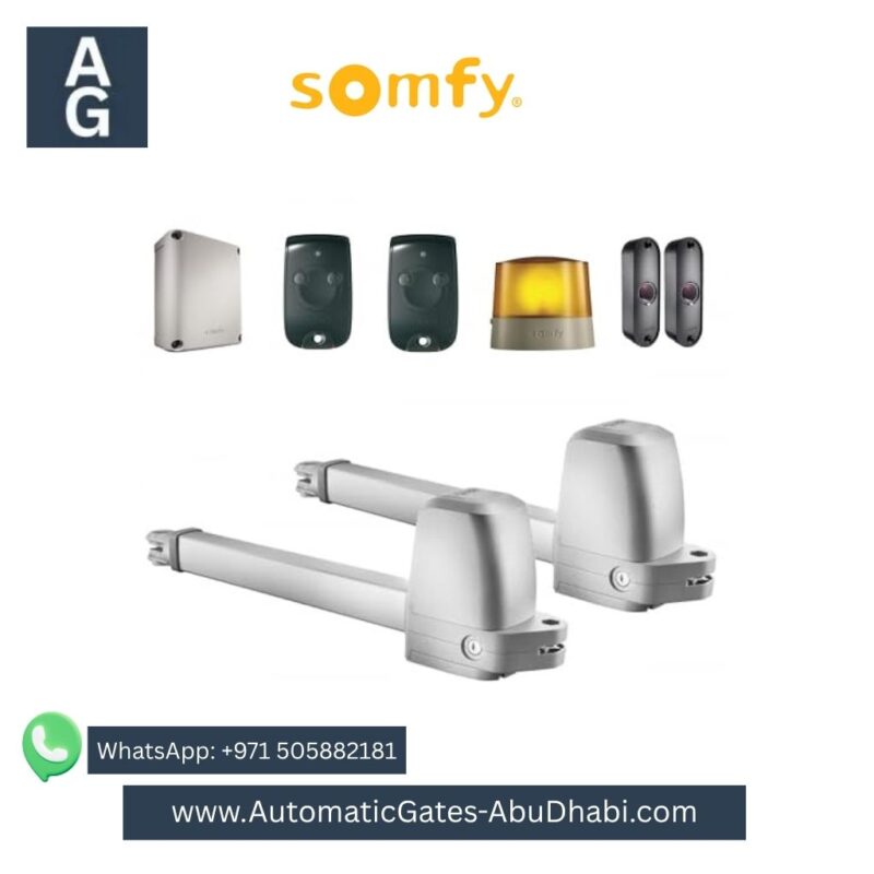 SOMFY IXENGO swing gate motor kit including two motors, control board, remote, safety sensors, and flashing light.