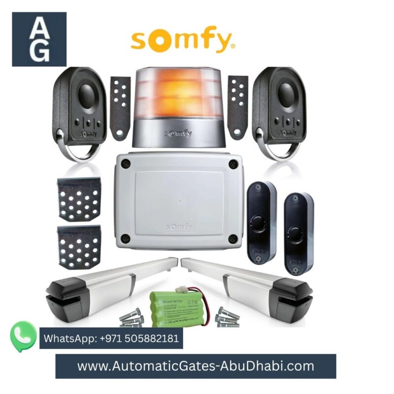 SOMFY IXENGO swing gate motor kit including two motors, control board, flashing light, remote controls, safety sensors, and battery backup.