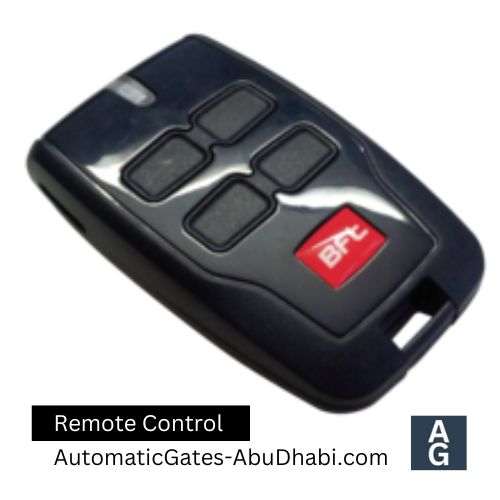 Black remote control with four buttons and a red logo.