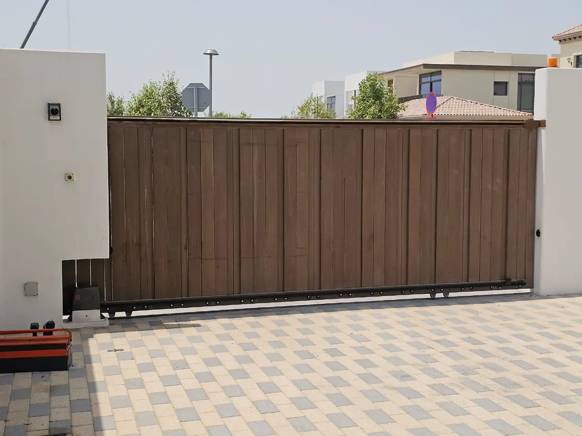 Automatic sliding gate on a villa at Jubilee Island, Abu Dhabi, during motor service